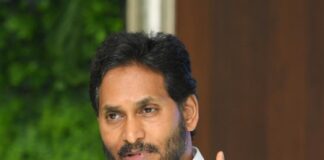 పోలీసు కారులో గంజాయి రవాణా